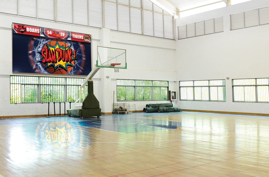 Showcase scores and celebrate victory with large-scale signage for athletic spaces