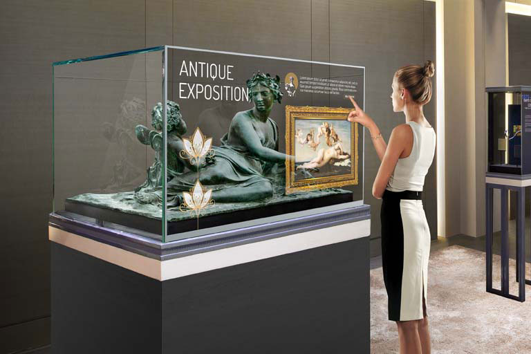 woman in front of display of antiques exposition 