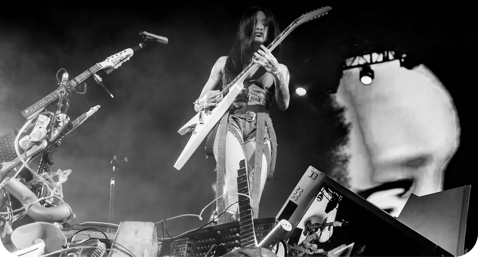 Willow playing guitar for desktop.